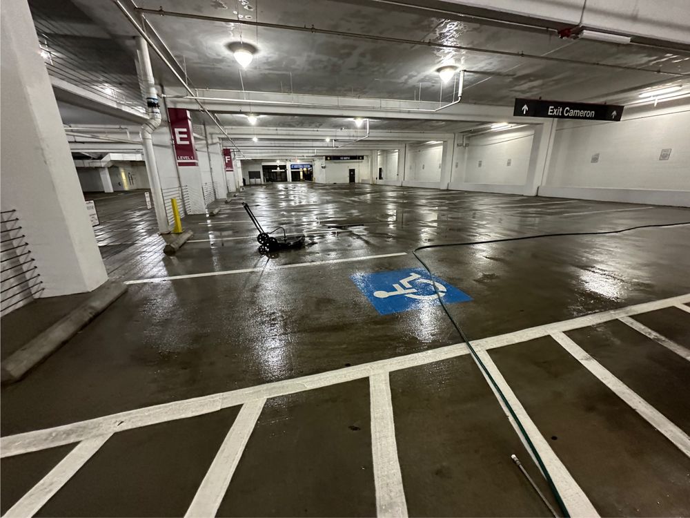 Our Parking Garage Maintenance service includes regular cleaning, pressure washing, and maintenance to ensure a clean and well-maintained parking area for your business. Improve curb appeal and prolong the life of your garage. for Power Pressure Wash in Houston, TX