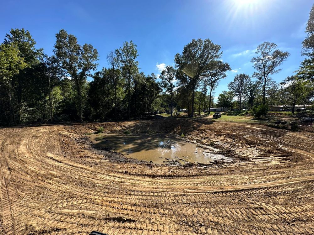 Transform your outdoor space with our expert pond construction service, combining skilled excavation and design to create a beautiful, serene water feature that enhances your property's natural beauty and value. for Central Alabama Site Works in Selma, AL