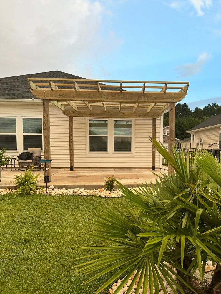 Transform your outdoor space with our expert Deck & Patio Installation service, offering customized designs and high-quality craftsmanship to create the perfect area for relaxation and entertainment in your backyard. for Fix It Handyman & Remodeling in Hampstead, NC