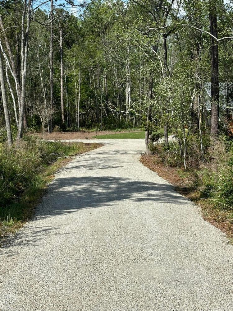 Enhance your home's curb appeal with our professional driveway installation service. Our skilled team also specializes in deck & patio installation, ensuring a seamless outdoor transformation that complements any property style. for Coursey Construction in Metter, GA