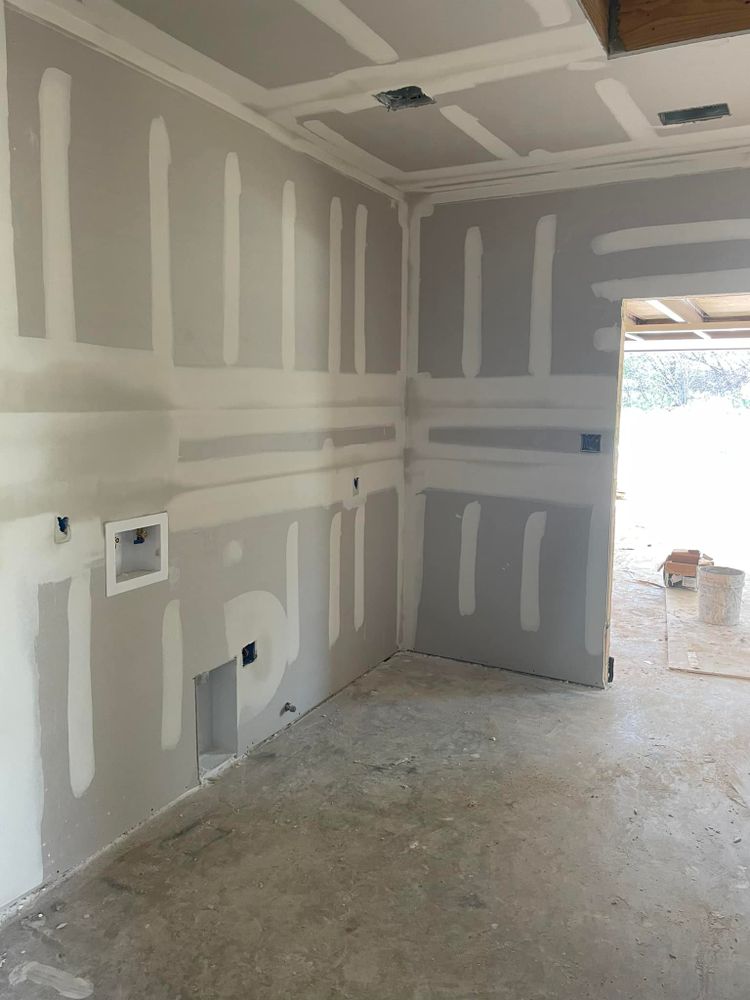 Our Drywall and Painting service offers expert solutions to transform your living spaces. From patching up walls to painting and staining, we ensure a seamless finish that enhances your home's aesthetic appeal. for Top Hand Construction in Azle,  TX