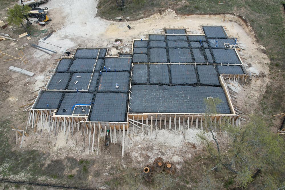 Our House Pads service provides a durable, level foundation tailored for your home construction needs, ensuring stability and longevity while enhancing overall property value. Trust us to lay the groundwork right. for EPE Concrete LLC in Kerrville, TX