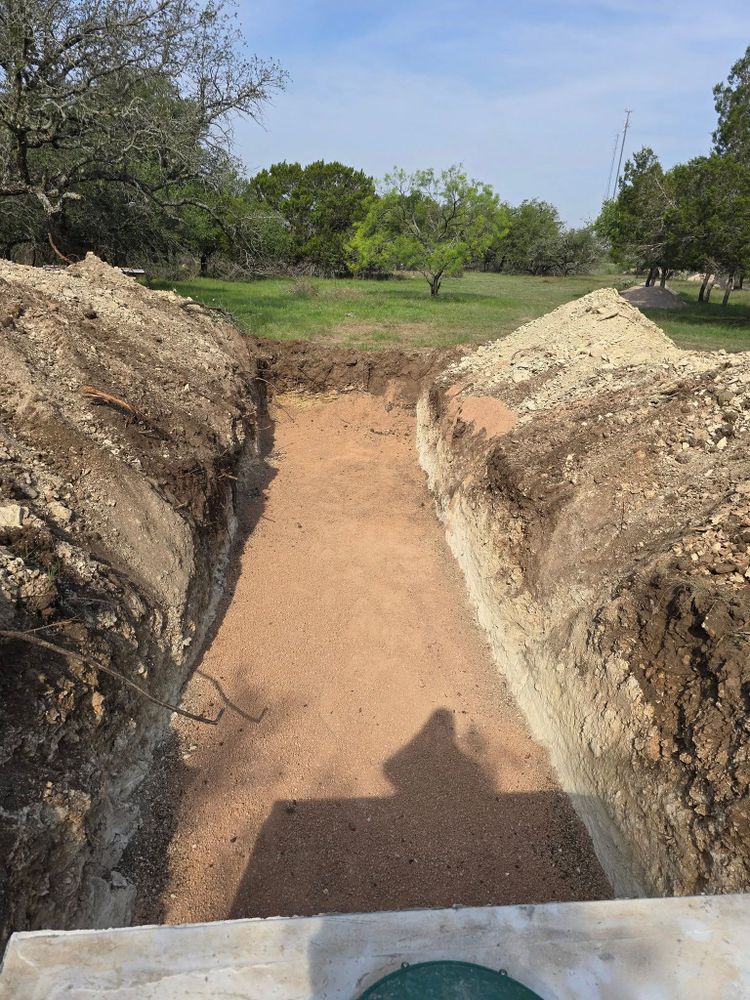 Our trenching service efficiently creates precise trenches for utility installations, landscaping projects, and drainage solutions, ensuring minimal disruption to your property while enhancing functionality and aesthetic appeal. for Evant Backhoe & Construction in Evant, TX