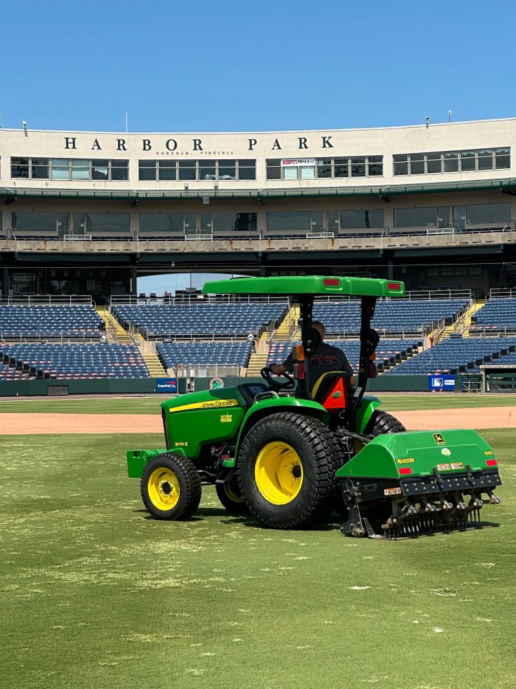 Our aerification services cover golf courses, game fields, and practice fields to improve your turf by relieving compacted soil, promoting better air and water circulation, leading to healthier turf growth and overall vitality. for Fowler's Turf & Grading in Virginia, Virginia