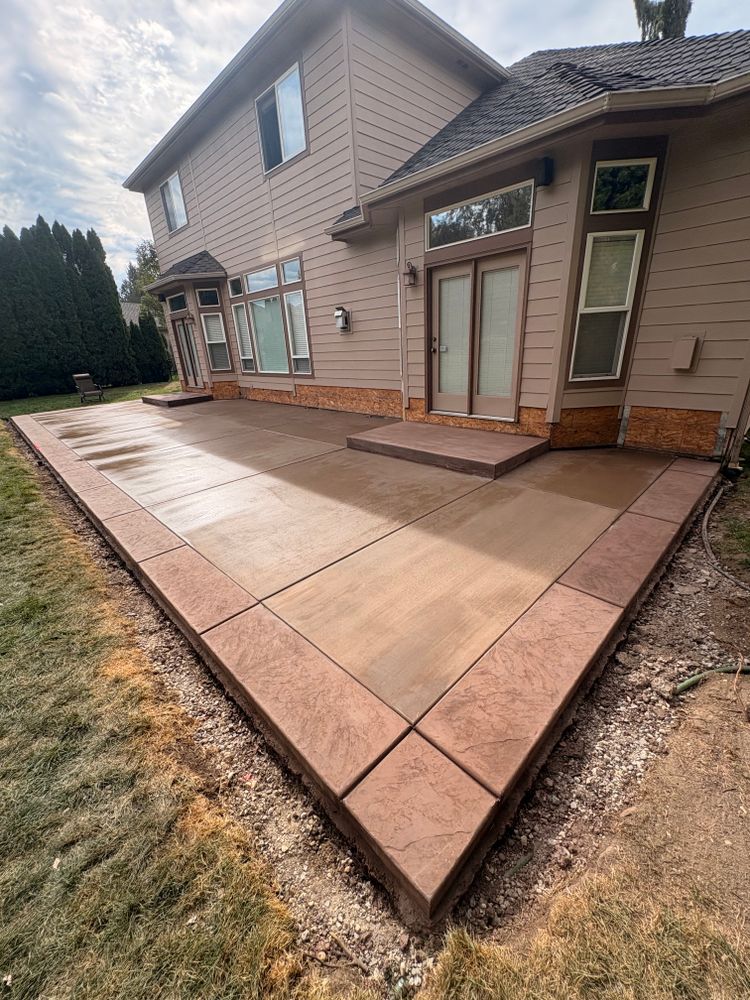 Transform your outdoor spaces with our Stamped Concrete Installation service, offering durable, stylish patterns that mimic natural materials. Enhance your home's curb appeal while ensuring longevity and low maintenance for patios, driveways, or walkways. for AMF Concrete Construction in Boise, ID