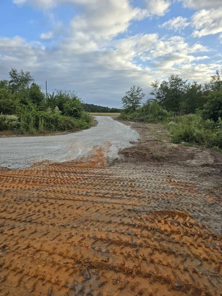 Our road installation service ensures a solid foundation for your driveways and private roads, providing expert excavation and grading to guarantee durability, stability, and smooth access to your property. for Heldapay Hauling & Grading in Charlotte, SC