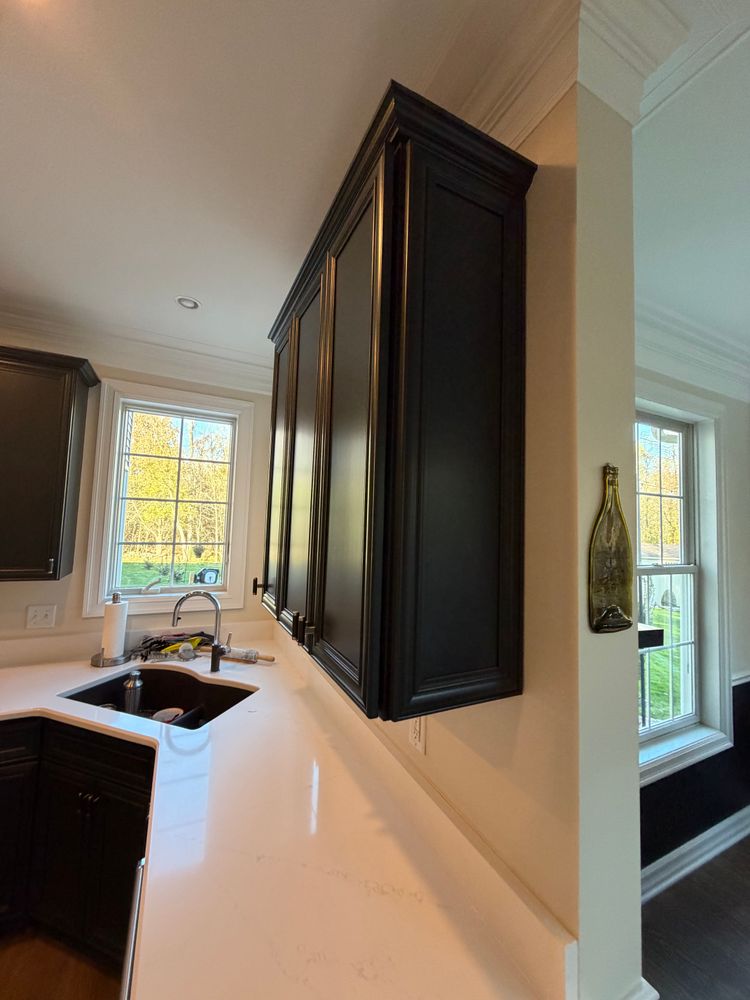 Our Kitchen and Cabinet Refinishing service will transform your outdated or worn cabinets into a fresh, modern look. Save time and money with our professional painting expertise for a stunning renovation. for  C&M Painting Finishing in Rochester, NY