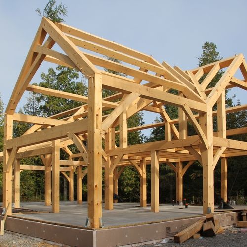 Our Timber Framing service offers the timeless beauty and structural strength of traditional wood construction, perfect for homeowners looking to add a touch of elegance to their new construction or remodeling project. for Horstmann Homes in Blackhills, SD