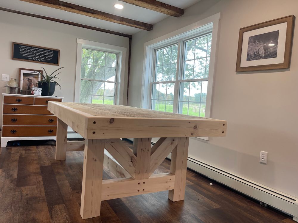 Elevate your new home with our Custom Timber Furniture service, where we craft unique, high-quality pieces tailored to fit your space perfectly and enhance the aesthetic appeal of every room. for McKenna General Contracting in Readfield, ME