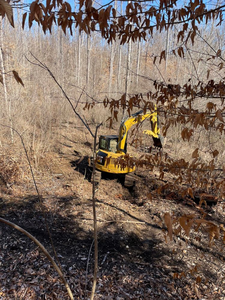 Our Land Clearing & Demolition service efficiently prepares your site for new projects, ensuring safe and thorough removal of debris, trees, and structures to create a clean slate for construction. for Beaver Excavating Services in Friendship, TN