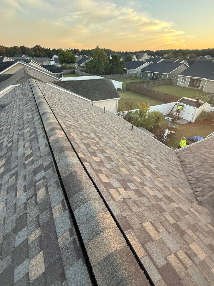 Our Shingle Roofing service provides durable, high-quality shingles expertly installed for lasting protection. Ideal for roofing repairs, we ensure your home remains secure and visually appealing against the elements. for Alpha Sky Roofing in Raleigh, NC