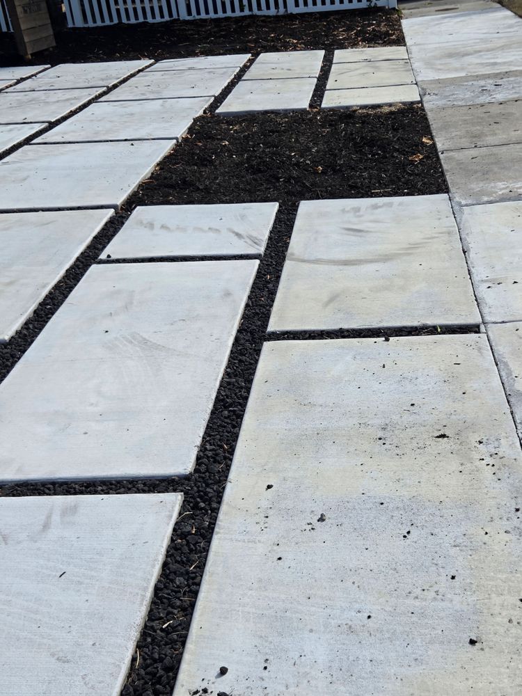 Transform your outdoor space with our Concrete Squares featuring Faux Grass or Rocks, offering a stylish and low-maintenance solution for enhancing aesthetics while ensuring durability and easy installation by professionals. for Beautiful and Affordable Stamped Concrete by Castilla Concrete Finish Design Corp in Sunrise, FL