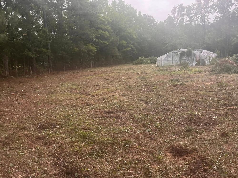 Our Fall Clean Up service ensures your property is pristine by removing leaves, debris, and prepping gardens for winter, enhancing curb appeal while protecting your landscape through the colder months. for Ty's and Sons in Burgaw, NC