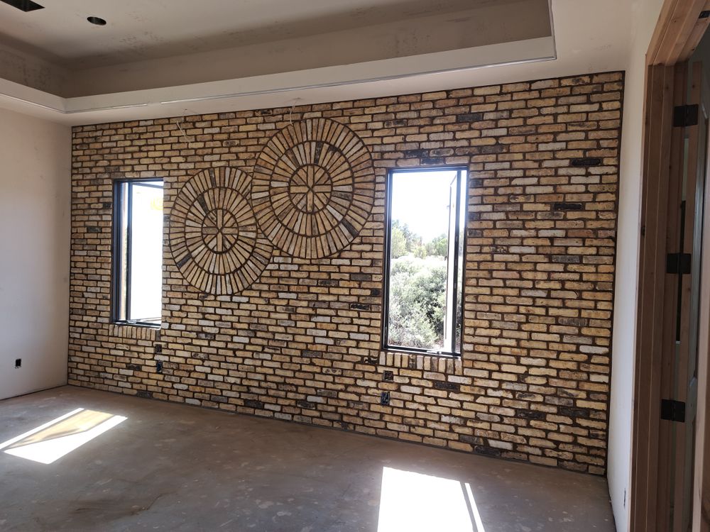 Our Brickwork service offers expert craftsmanship for new constructions or renovations, ensuring durability and aesthetic appeal in every project to enhance your home's architectural charm and value seamlessly. for Exquisite Techniques Construction LLC in Prescott, AZ