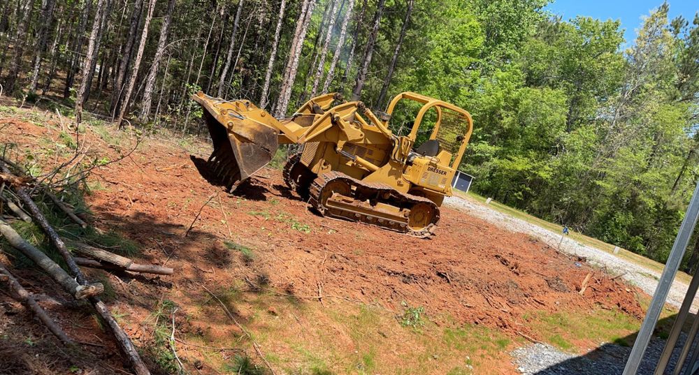 Our Land Clearing service helps you transform overgrown or uneven areas into usable spaces by removing trees, brush, stumps. Find quality plowing near me services for residential needs. for Erskine Grading and Clearing LLC in Anderson,, SC