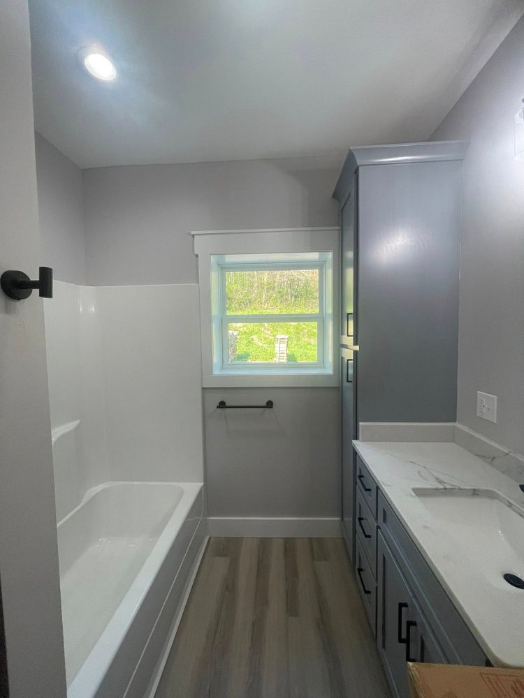 Transform your bathroom into a stunning, functional space with our expert renovation services. We offer personalized designs, quality craftsmanship, and efficient project management for a seamless remodeling experience. for Nailed It in Murphy, NC