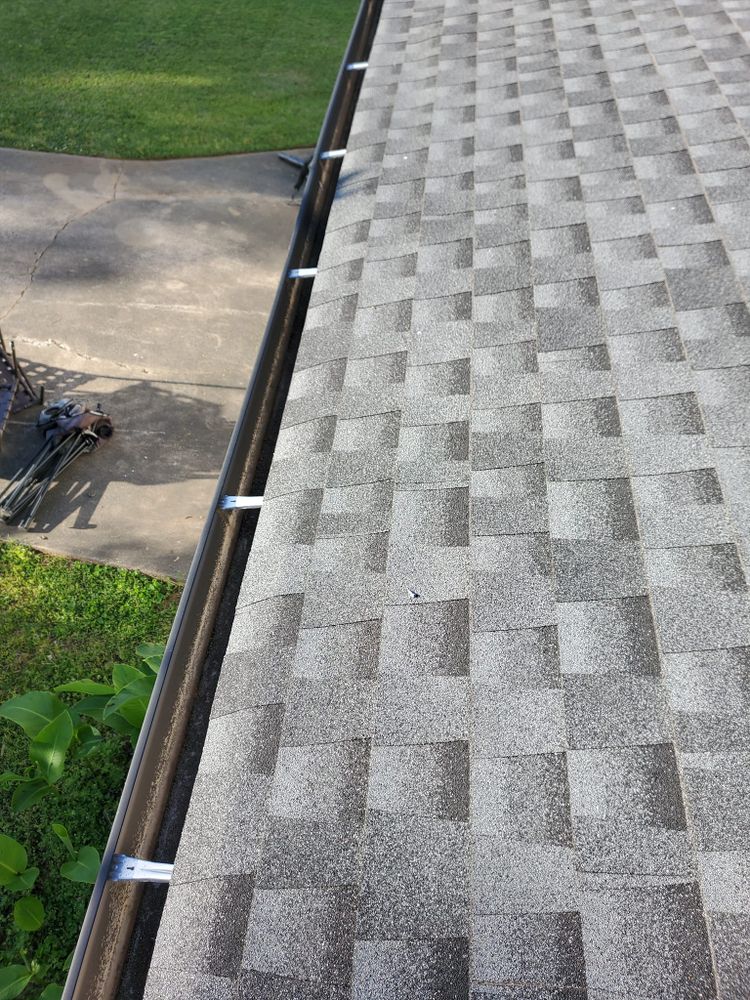 Keep your home safe from water damage with our professional gutter cleaning services. We ensure that your gutters are clear of debris to protect your property all year round. for A&A MultiScapes and Tree Service in Dallas,  GA