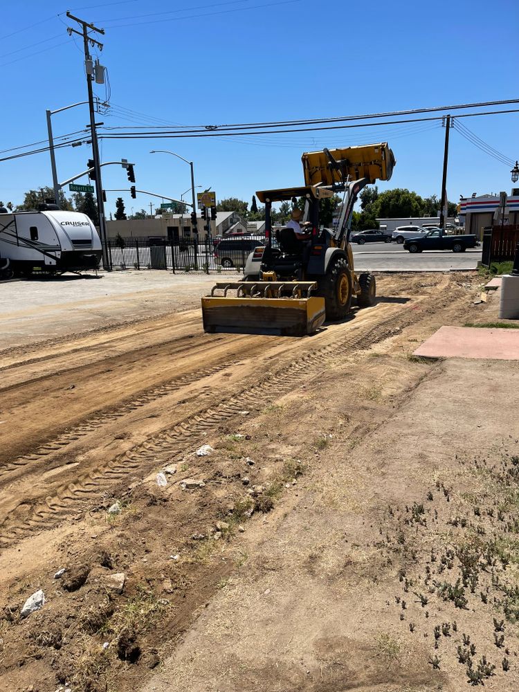 Our Grading service ensures your concrete project starts on solid ground. We expertly level and prepare the site for a flawless finish that will stand the test of time. for Ryan Berrys Concrete Construction in Bakersfield, CA