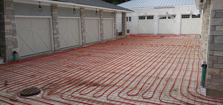 Our Ice Melt Systems provide efficient, reliable solutions to prevent ice buildup on driveways and walkways, enhancing safety and convenience during winter months while protecting your property's exterior surfaces from damage. for Ontrack Exteriors in Payson, UT