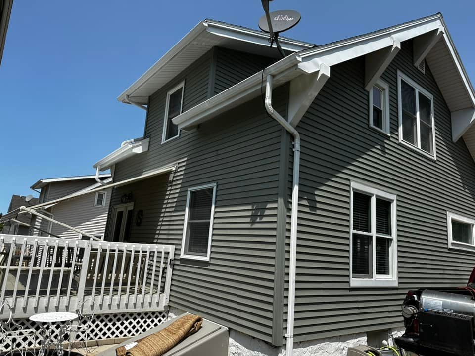 Enhance your home's curb appeal with our expert house roof washing service, effectively removing dirt and grime. Pair with fence washing for a complete clean that revitalizes your property's appearance. for Konz Pressure Washing in Manitowic, WI