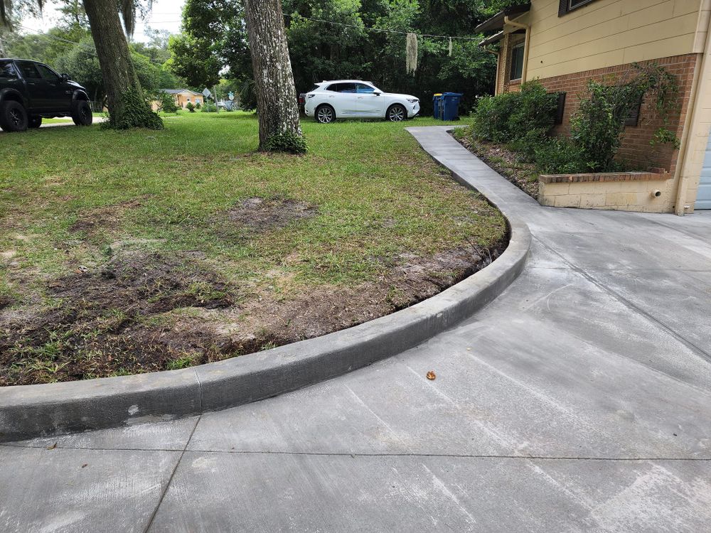 Our Sidewalk Installation service provides homeowners with durable and aesthetically pleasing walkways. We ensure precision in craftsmanship and use high-quality materials to enhance the appearance and functionality of your outdoor spaces. for Solid Foundation Contractors in Jacksonville, FL