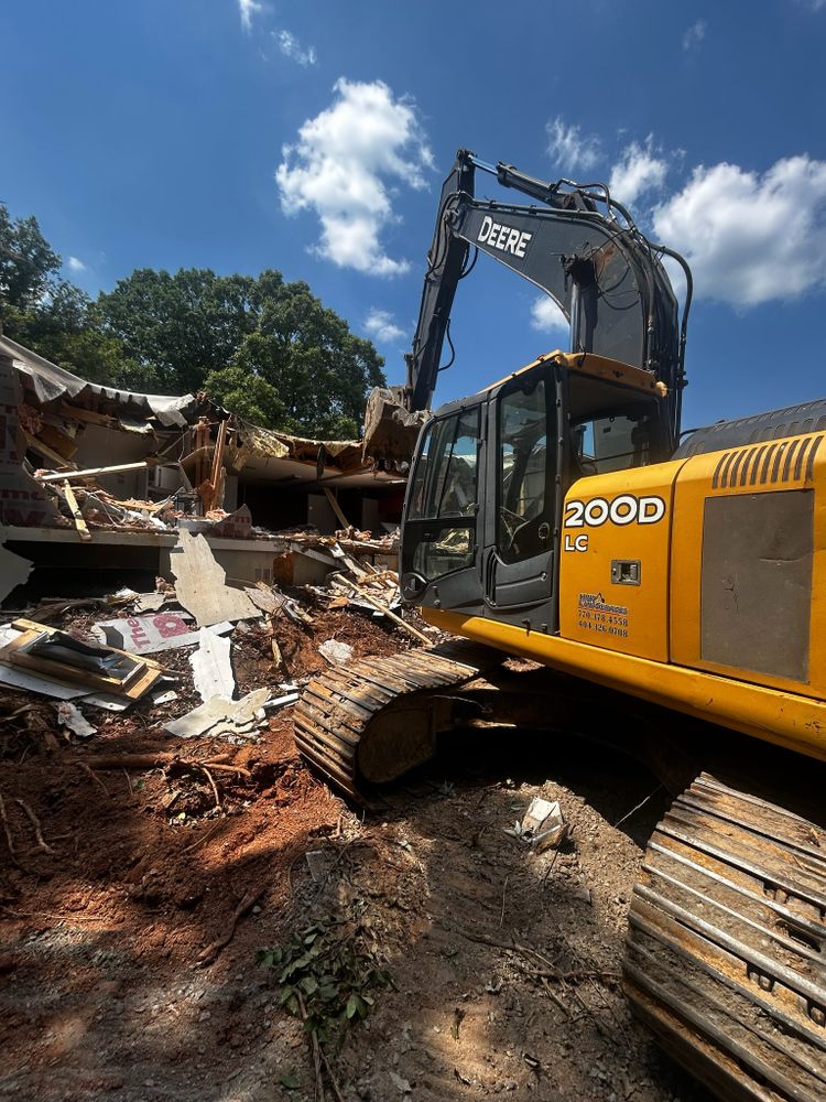 Our Demolitions service safely and efficiently removes unwanted structures, ensuring a clean slate for your property projects while prioritizing safety and environmental responsibility. Trust our experts for precise, hassle-free solutions. for HRW Land Services in Canton, GA