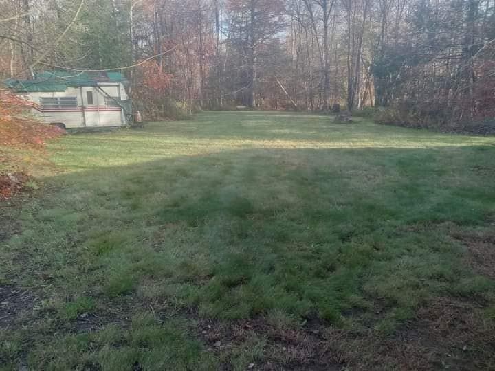 Our Lawn Aeration service improves soil structure, encourages healthy root growth, and enhances water absorption for greener, lusher grass. Contact us today to experience a vibrant and thriving lawn! for K Brown's Property Maintenance in Pittsfield, MA