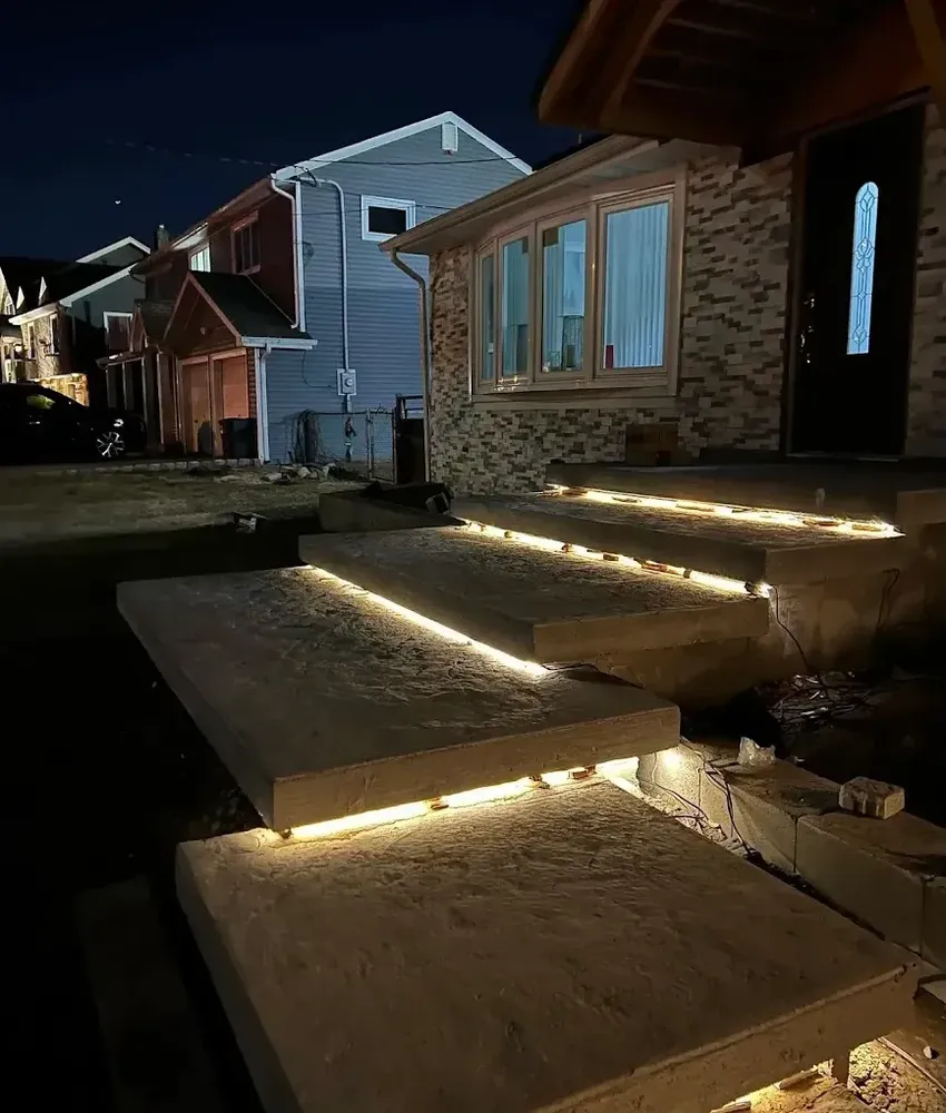 Enhance your home's beauty and security with our professional outdoor lighting solutions—perfectly designed to accentuate hardscaping features while providing functional illumination for pathways and entertaining areas all night long. for Pools, Patios, Perfection. We Build It All. in Boston, MA