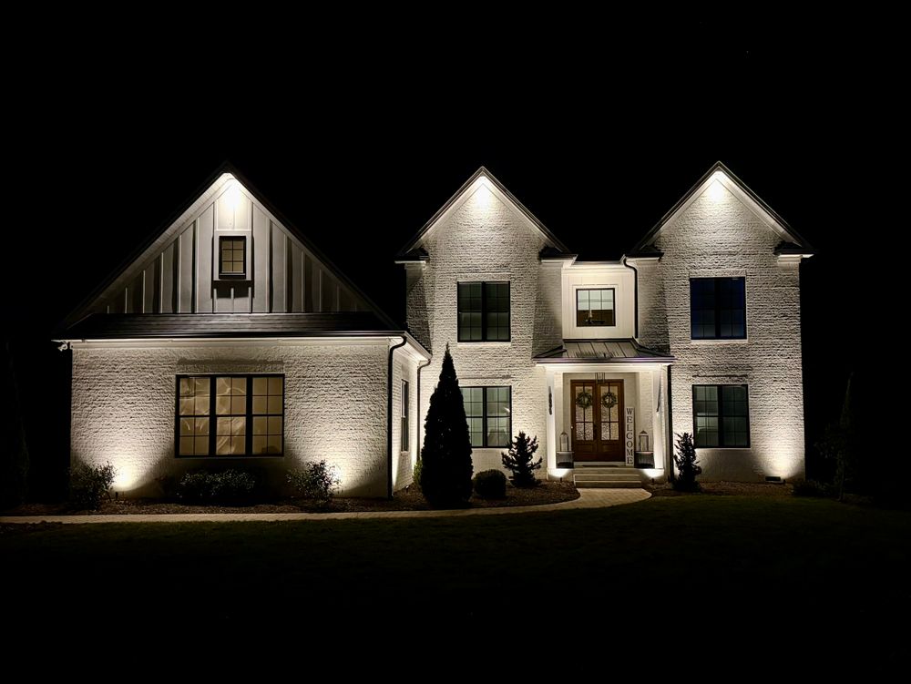 Enhance your home's beauty and security with our expert outdoor lighting design and installation. We tailor each project to illuminate key features, ensuring a stunning landscape that transforms after dark. for Malboeuf Landscaping, Inc in Kernersville, NC
