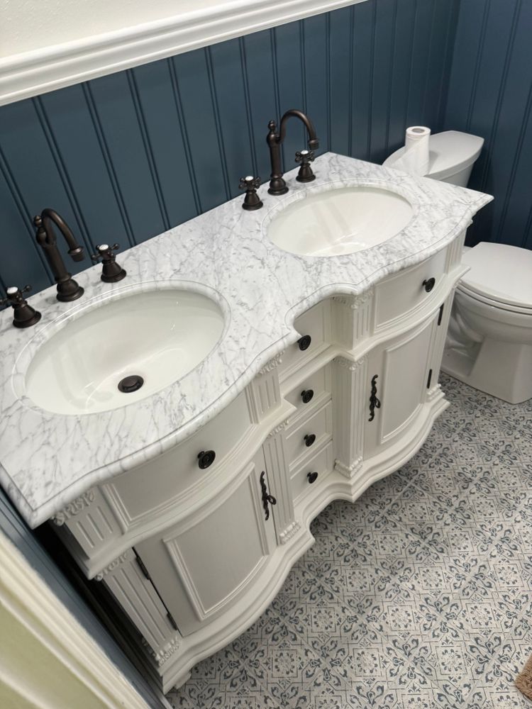 Transform your bathroom into a modern oasis with our expert renovation services, providing high-quality craftsmanship and personalized designs to suit your style and enhance functionality for ultimate comfort and relaxation. for JPH Builders Inc. in Milton, FL