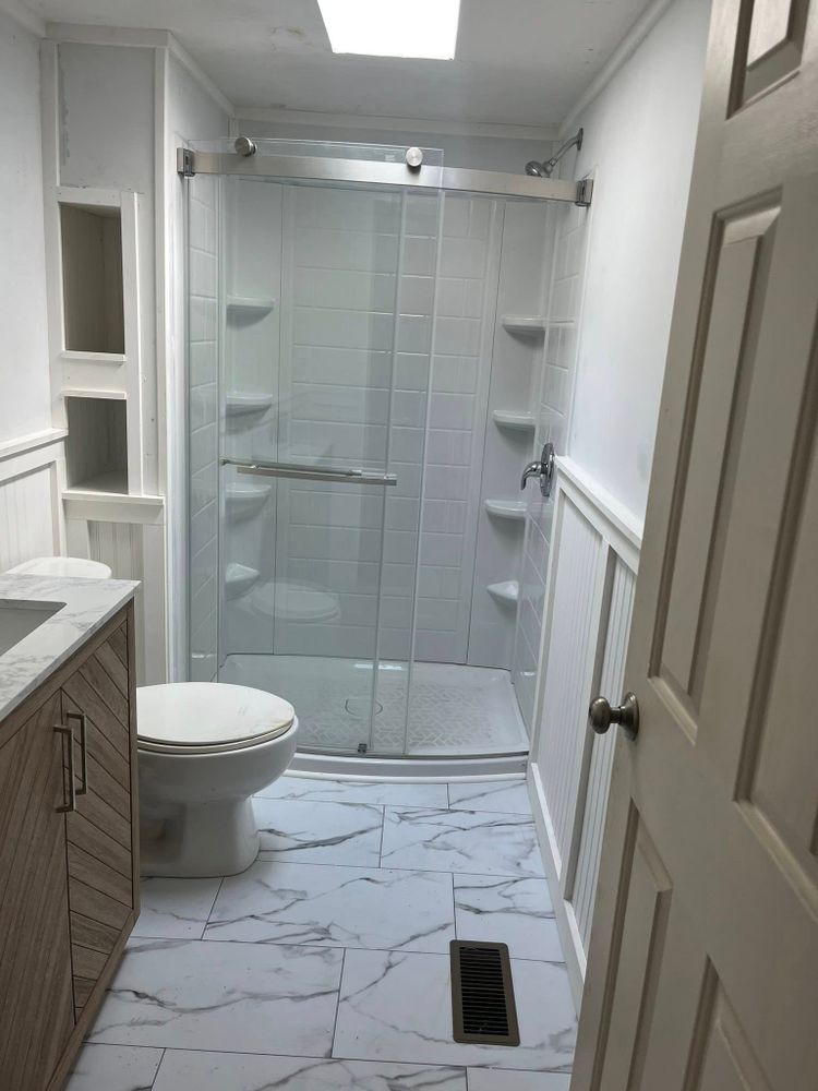 Transform your space with our expert bathroom renovation service, offering modern design solutions and quality craftsmanship to enhance functionality, comfort, and style in your home effortlessly. Satisfaction guaranteed. for Powers Contracting LLC in Swanzey, NH