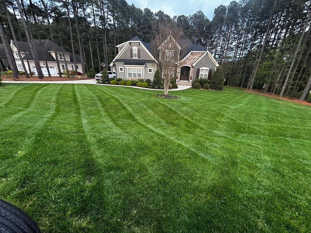 Our professional mowing service keeps your lawn neat, healthy, and well-manicured with precise cuts, clean edges, and dependable scheduling—enhancing curb appeal while saving you time and effort year-round. for Jem Landscaping LLC in Wendell, NC