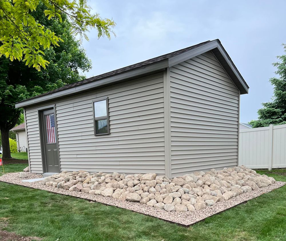 Enhance your outdoor living space with our expert Patio Design & Construction service. We offer customized, durable solutions that blend functionality and aesthetics to create the perfect retreat for your home. for Stitch's Landscape in Howard, WI