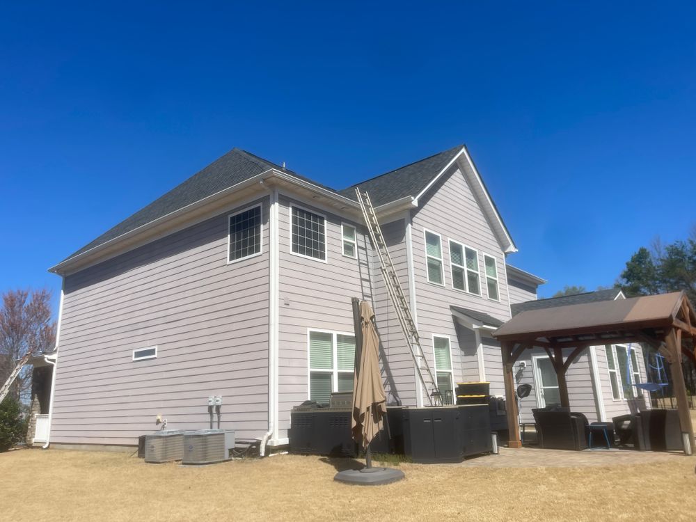 Ensure your home is protected with our Gutter Cleaning service. We remove debris and install the best gutter guards to prevent clogs and enhance your roofing system's efficiency year-round. for Rocky River Contractors, LLC in Charlotte, North Carolina