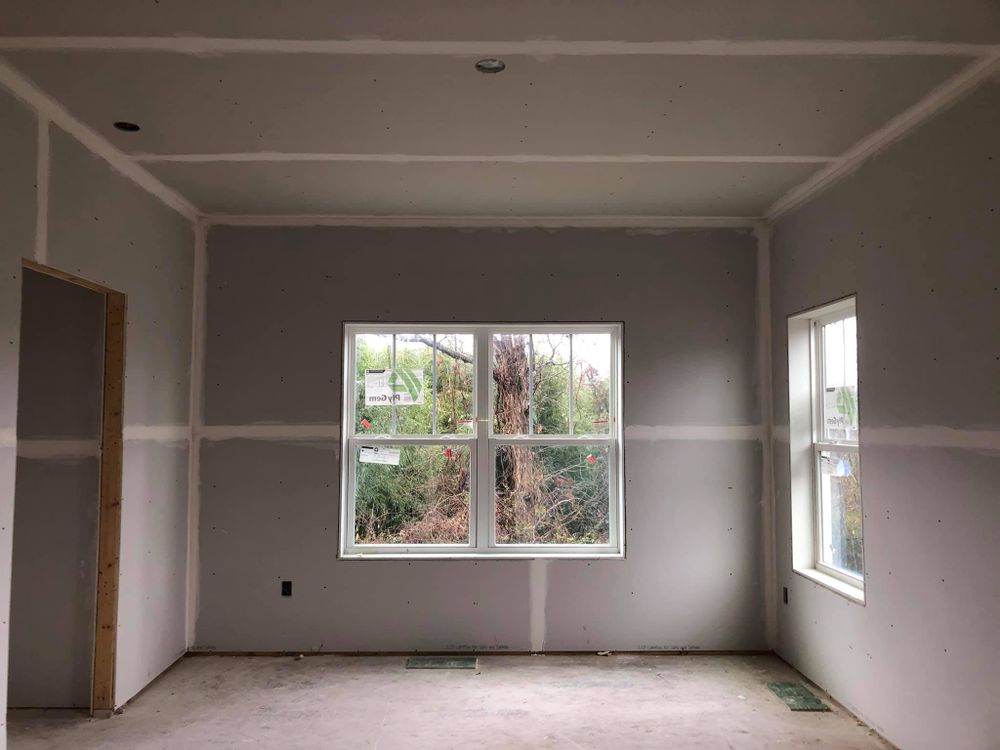 Our Drywall Finishing service delivers seamless, smooth surfaces through expert taping, mudding, and sanding techniques. Transform your walls with precision craftsmanship for a flawless finish that enhances the beauty of your home. for BlueLine Drywall in Asheville, NC