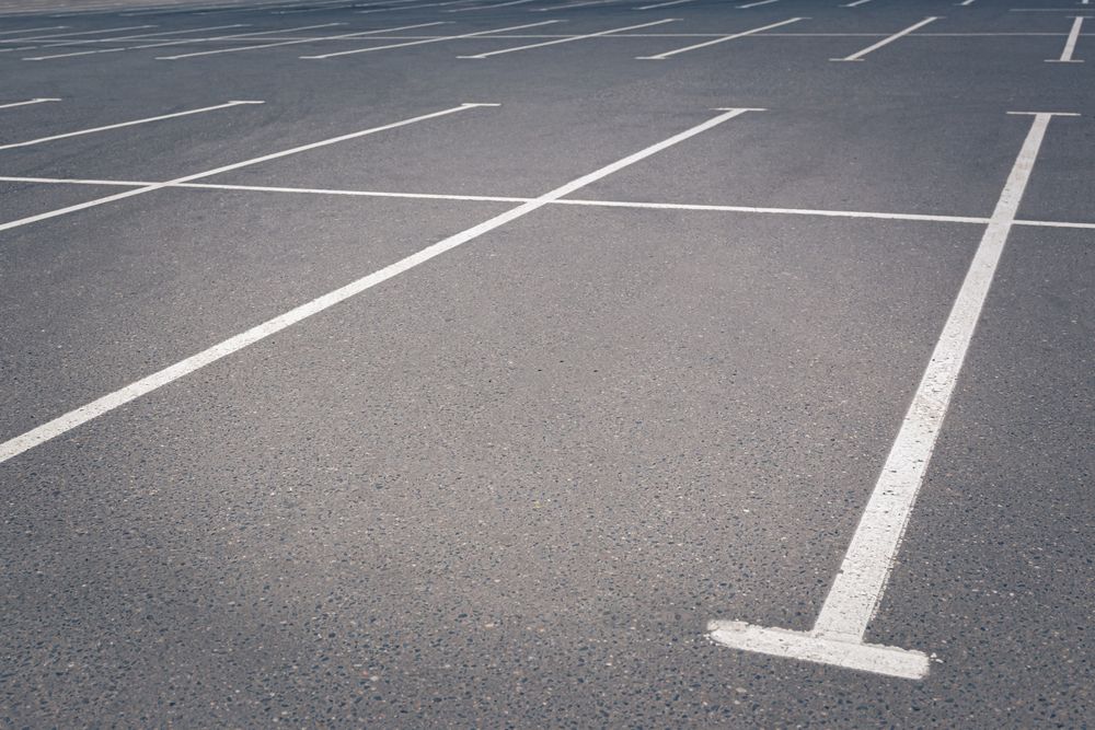 Our Commercial Seal Coating service protects and enhances the appearance of your driveway or parking lot, extending its lifespan and saving you money on costly repairs in the long run. for Black Diamond Sealcoating in St. Charles, IL