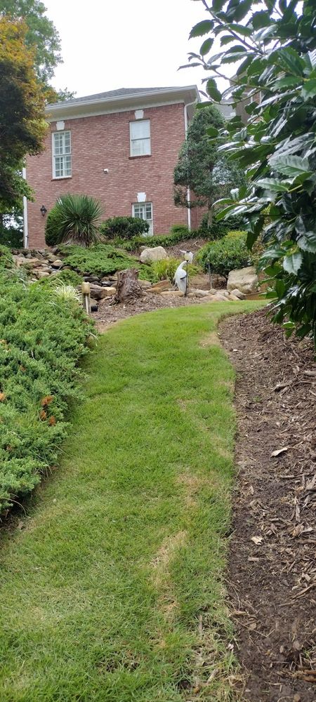 Flower Bed Installation is a service provided by our Landscaping company. We will install mulch in your garden or landscape to help protect the soil and add beauty to your property. for Palmetto Cuts Lawn Care LLC in Simpsonville, SC