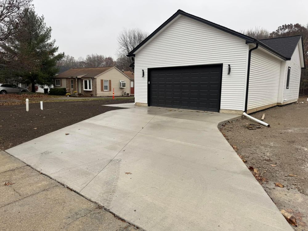 Our Concrete service is essential for providing durable and long-lasting foundations, driveways, sidewalks, and other structures. See how our expertise in working with concrete can enhance your home today. for The Guys Landscaping & Foundation Repairs LLC in Trenton, MI