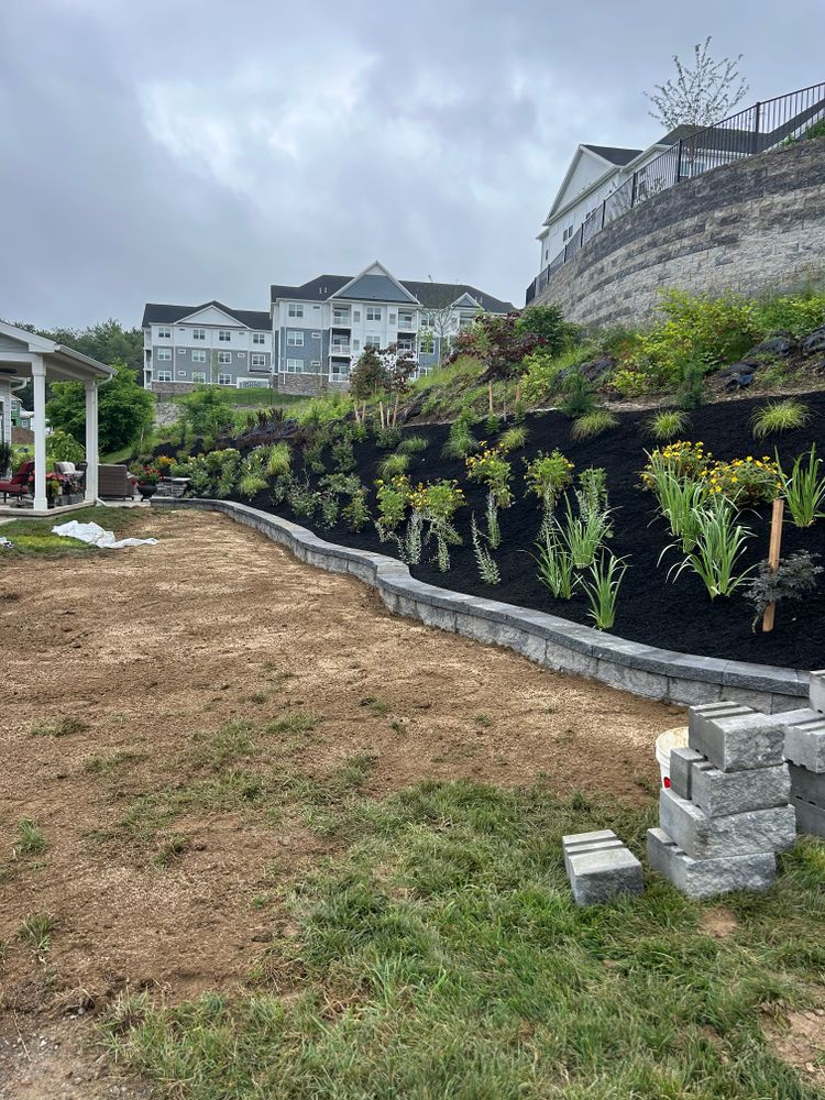 Our mulch installation service enhances your landscape's beauty, conserves soil moisture, and suppresses weeds. Trust our experts for professional application to ensure your garden stays healthy and visually stunning year-round. for J & T Landscaping Services in Mechanicsburg, PA