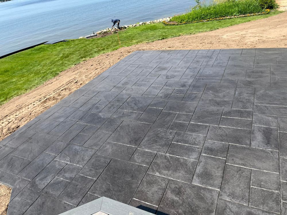 Transform your outdoor space with our expert stamped concrete installation, offering beautiful, durable surfaces that mimic natural stone at a fraction of the cost. Enhance your home’s curb appeal effortlessly. for JR Concrete in Cadillac, MI