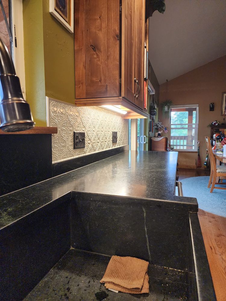 Enhance your kitchen's aesthetic with our professional backsplash tiling service, offering expert installation and a wide range of stylish designs to complement any decor and protect your walls. for SoCo Tile in Canon City, CO