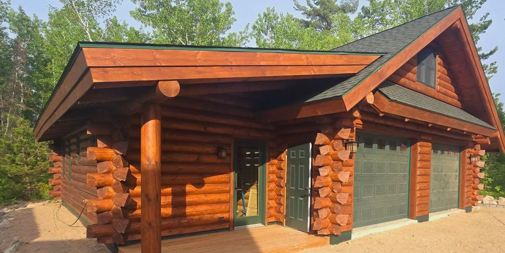 Enhance your log home's durability and energy efficiency with our expert Chinking service, providing a flexible seal between logs to prevent drafts, moisture intrusion, and pest entry while maintaining rustic charm. for 218 Painting & Log Restoration LLC in Britt, MN