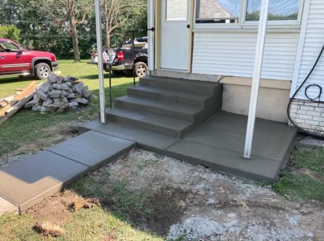 Enhance your home's elegance with our expert stair design and installation services. We craft durable, custom concrete stairs that blend aesthetics and functionality, ensuring a perfect fit for your unique space. for Snider Concrete in Springfield, IL