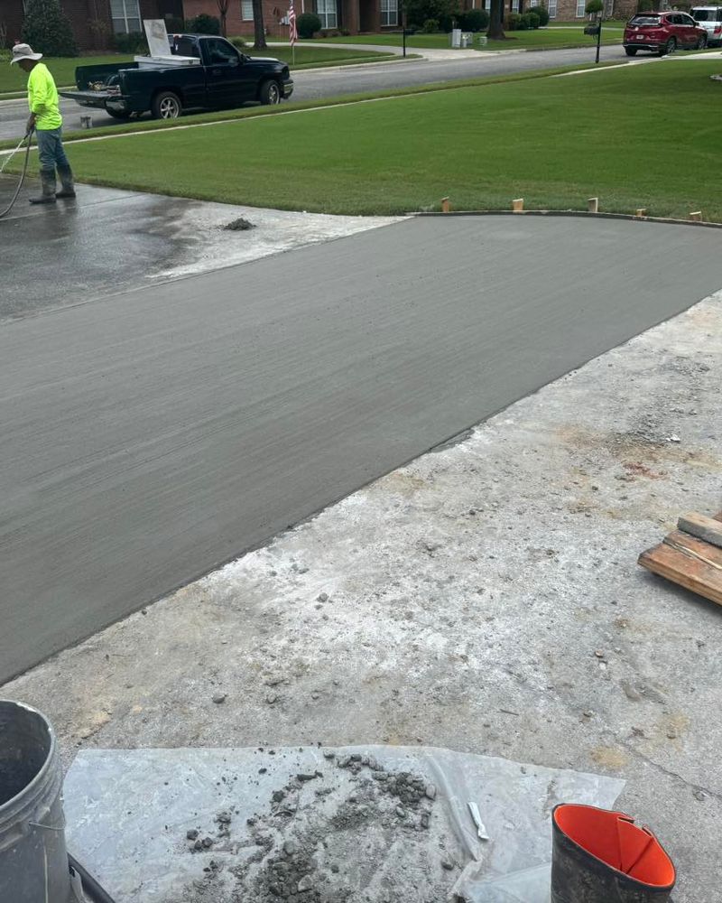 Our Concrete Repair service restores structural integrity and aesthetic appeal to your surfaces, fixing cracks, smoothing uneven areas, and extending the lifespan of your driveway, patio, or walkway efficiently and affordably. for Tavarez Designs LLC in Huntsville, AL