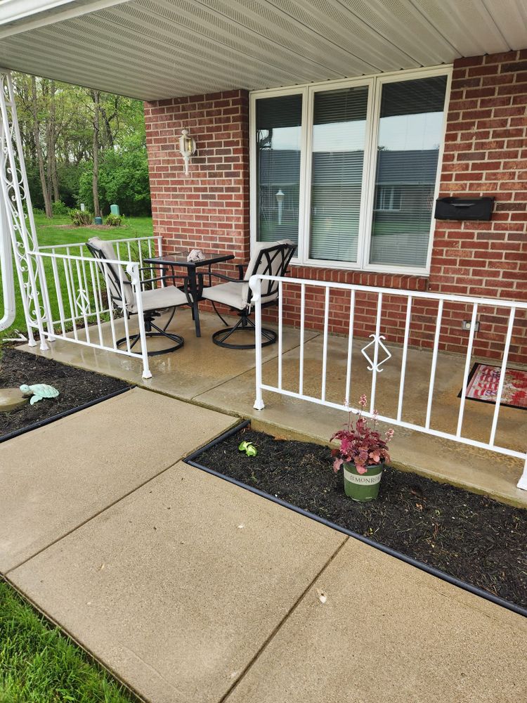 Revitalize your home's exterior with our Concrete Power Washing service, effectively removing dirt and grime to restore the pristine appearance of driveways, walkways, and patios for enhanced curb appeal. for Tel Ma Landscaping Maintenance LLC  in Urbana, OH