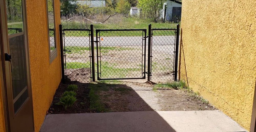 Our professional gate installation service adds security, privacy, and curb appeal to your home with durable materials, expert craftsmanship, and customized designs that perfectly match your fence and property style. for Nelson Family Fence in Maplewood, MN