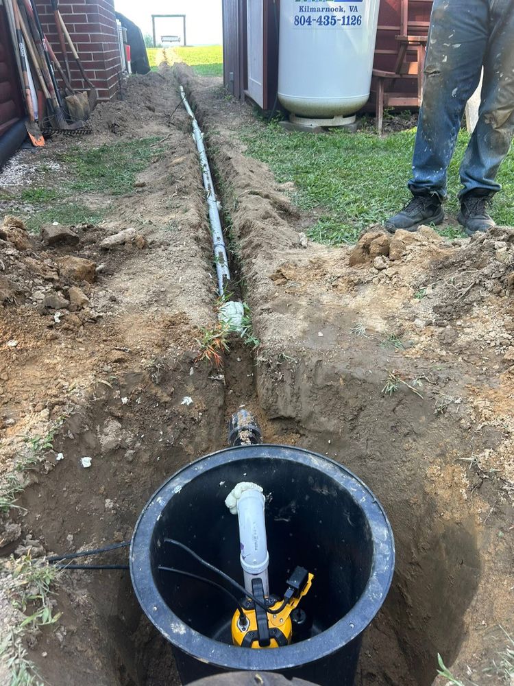 Our water drainage solutions effectively prevent flooding and soil erosion, protecting your property while enhancing landscape beauty. Trust our expert team to provide tailored systems for efficient rainwater management in your yard. for The Whole 9 Yards Landscape VA in Heathsville, VA