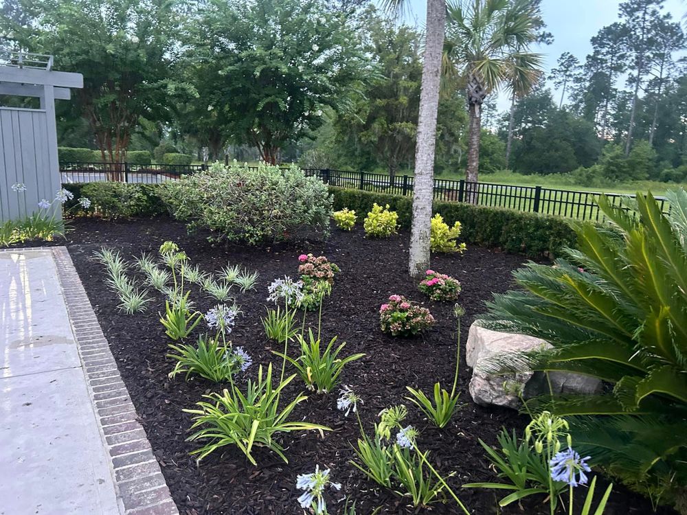 Enhance your garden's aesthetic appeal with our Mulch Installation service. Our team will expertly spread mulch to suppress weeds, retain moisture, and improve soil health for a vibrant landscape. for Golden Isles Greenery in Brunswick, GA