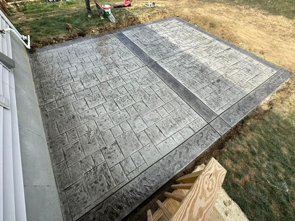 We offer stamped concrete installation to enhance your home's aesthetic appeal with customizable patterns and colors, providing a durable and cost-effective alternative to traditional materials like brick or stone. for Tanenbaum Services & Concrete in Florence, KY