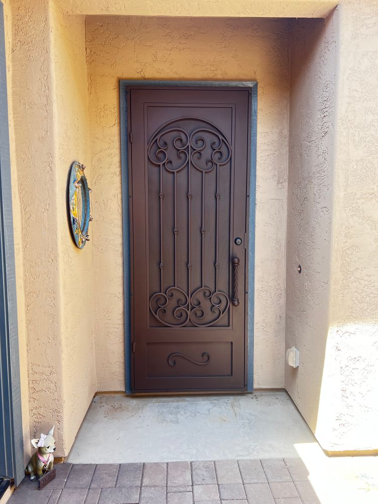 Our Security Doors service enhances your home's safety with custom-made, durable doors that provide an extra layer of protection against intruders while complementing your property's aesthetic appeal. for Metal Art Deco in Glendale,  AZ